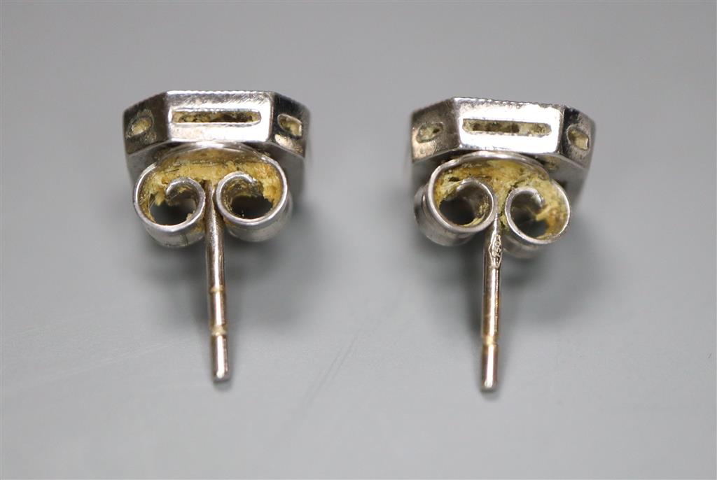 A pair of 750 white metal and octagonal diamond cluster ear studs, with asscher? cut central stones, 8mm, gross 2.7 grams.